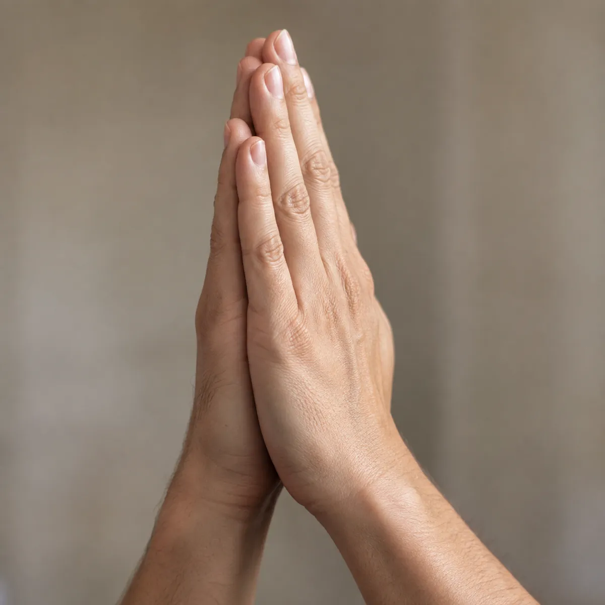 Praying hands reference photo, the source the tattoo stencil was traced from (AI-generated example)